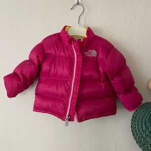 The North Face pink puffer jacket